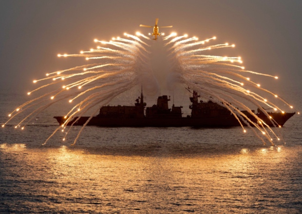 HMS Richmond with flares